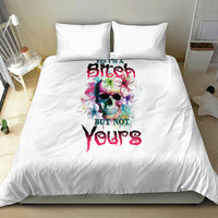 White duvet bedding set with two pillowcases featuring a multicolor skull graphic and text