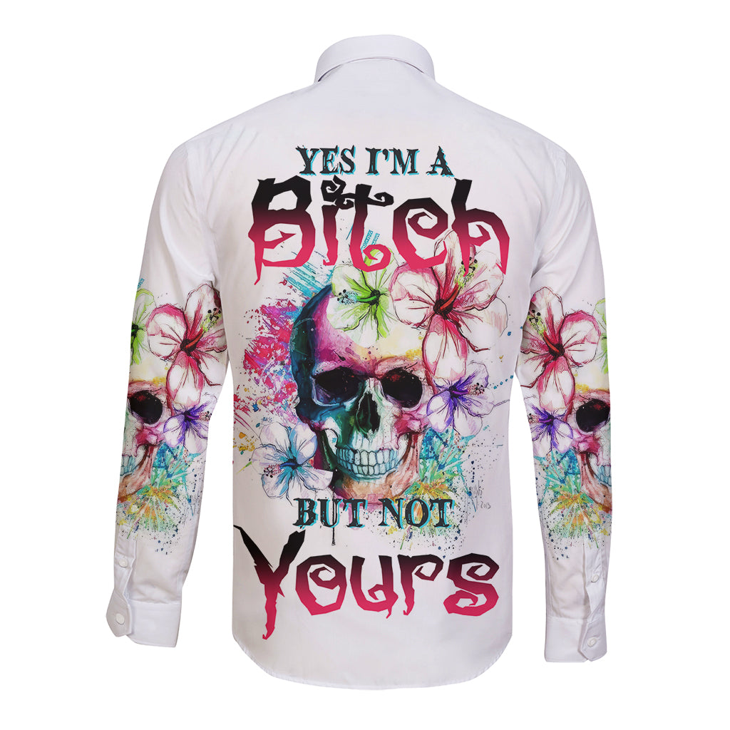 White long-sleeve button shirt with colorful skull-and-flower graphic on back