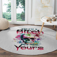Round gray carpet with multicolor skull graphic and centered graffiti-style text.