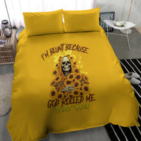 Yellow bedding set with skull reaper and sunflower graphic on duvet, two pillowcases
