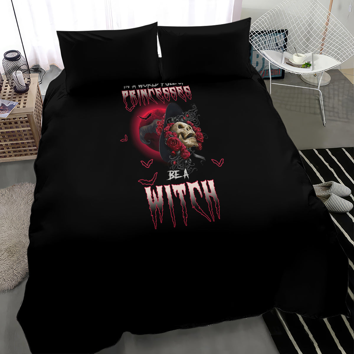 Black comforter and pillow set with bold red Be a Witch graphic and skull face