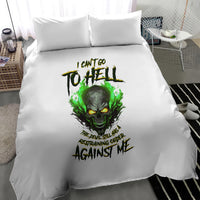 White bedding set with centered green skull artwork and two pillows
