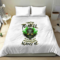 White bedding set with green skull graphic on duvet and two matching pillows
