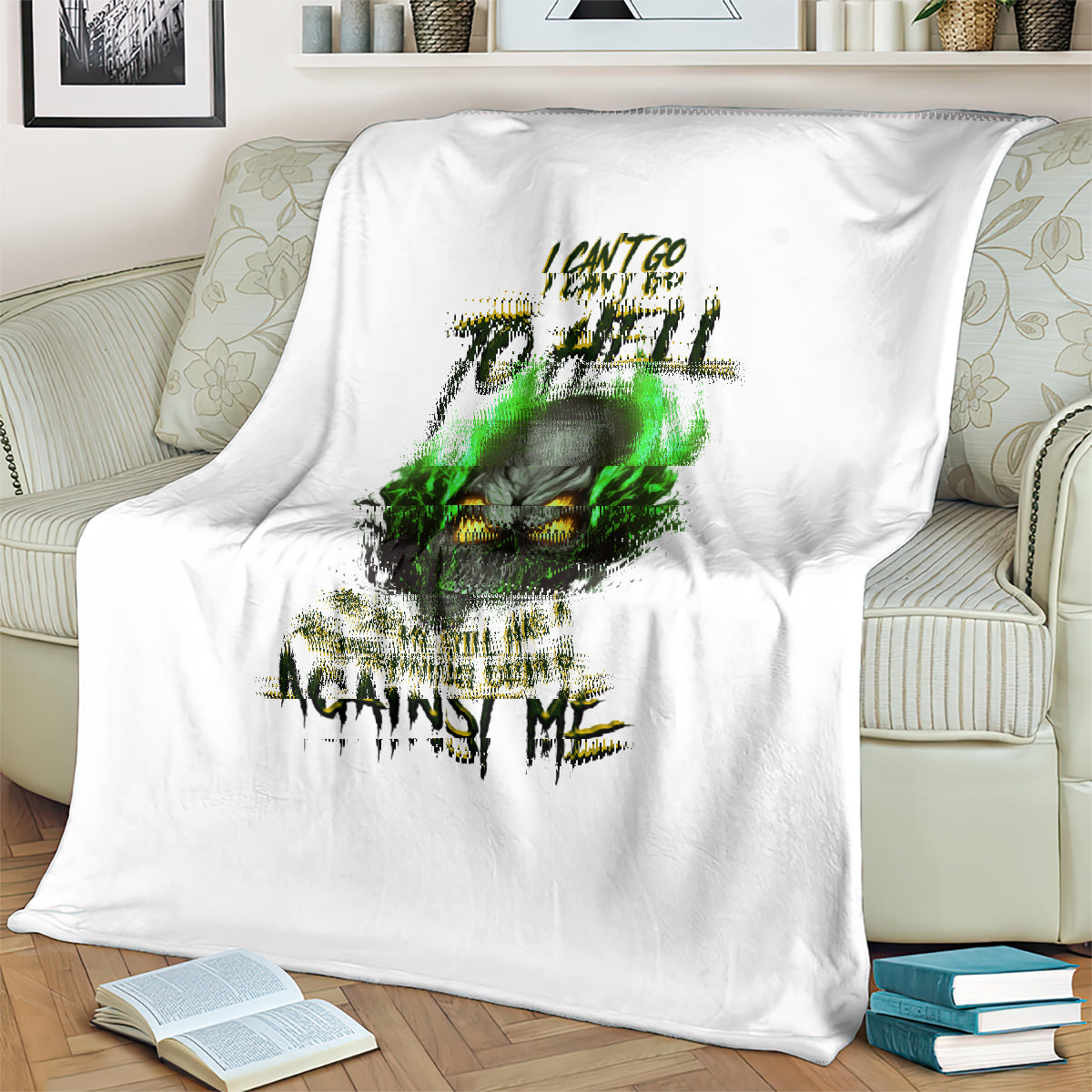 White skull graphic throw blanket with green skull face and warning text