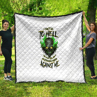 White quilted blanket with green skull graphic and bold dark lettering