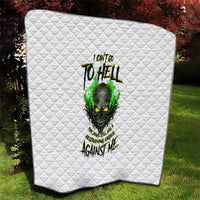White quilted blanket with green glowing skull illustration and stylized words