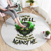 Round carpet with green skull graphic and black hazard-style text on light gray base