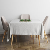 Round tablecloth with centered green skull and dark text graphic