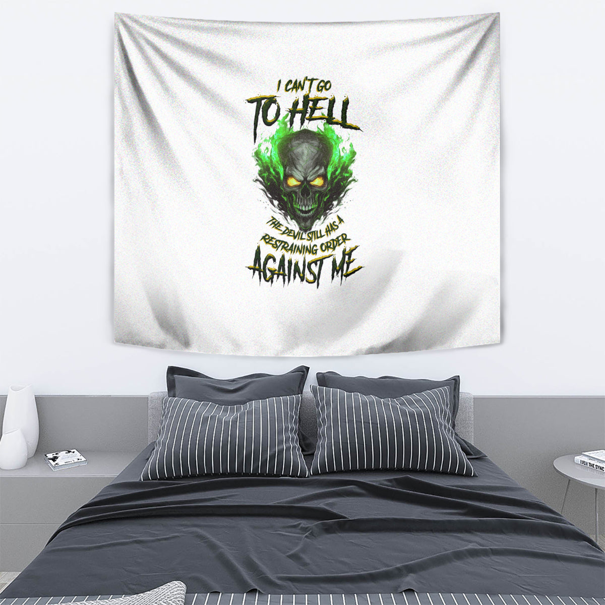 White skull graphic tapestry with green flames and stylized text, hanging on wall