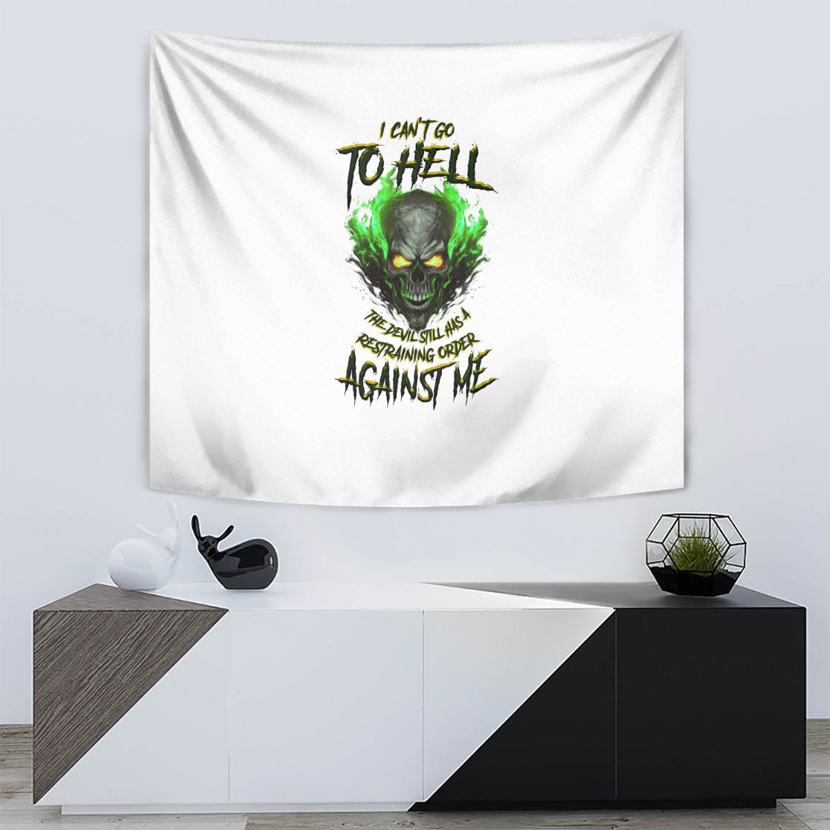 White skull graphic tapestry with green accents and bold black text, centered