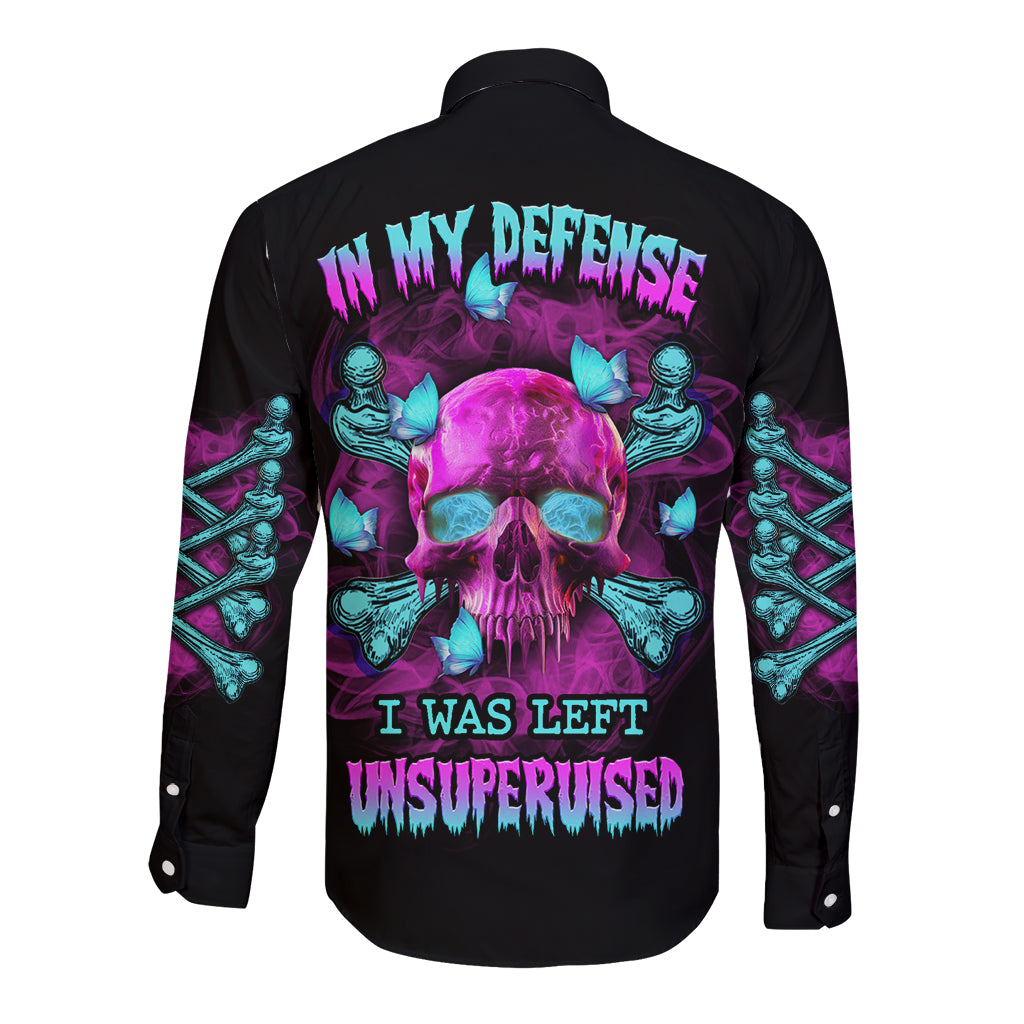 Black long-sleeve button shirt with back skull graphic and purple/teal lettering