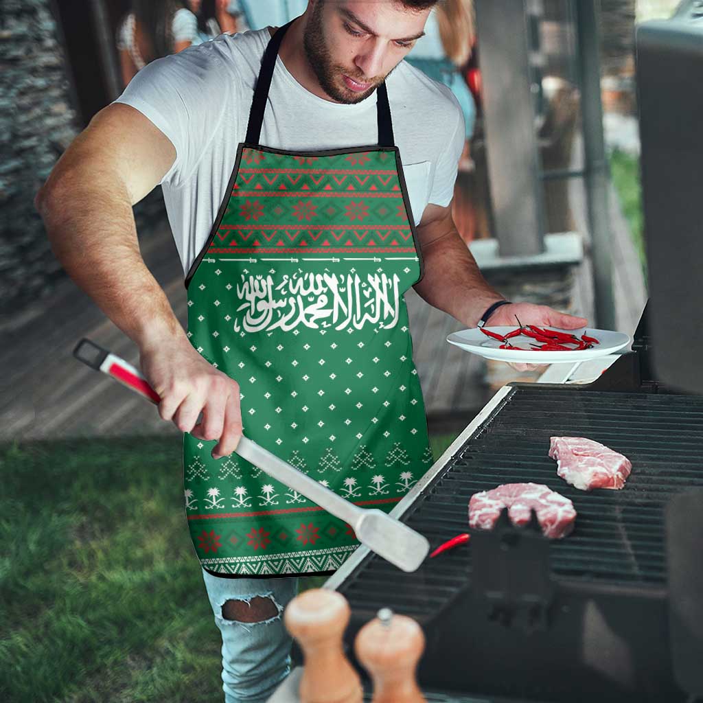 Saudi Arabia Christmas Apron with Green Pattern, Traditional Script Motif, and Camel Caravan Silhouette - Wonder Print Shop