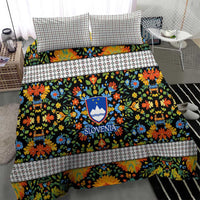 Folk art duvet cover with multicolor floral pattern, white geometric trim, and Slovenia crest
