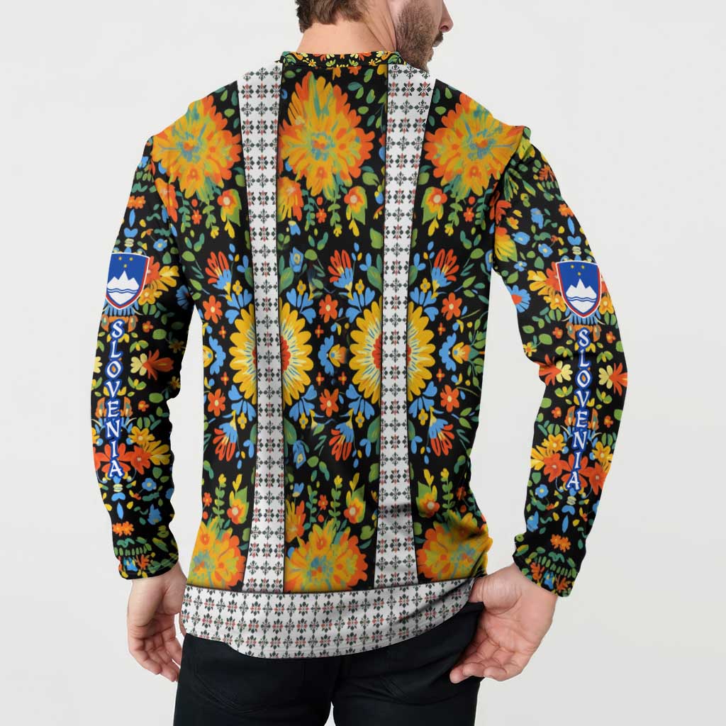 Back view multicolor floral button sweatshirt with vertical white trim and blue crest emblem.
