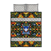 Multicolor floral quilt bed set with central Slovenia crest and two pillowcases