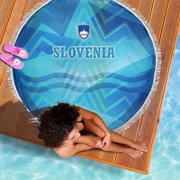 Round blue beach blanket with white fringe, SLOVENIA and crest, alpine geometric design