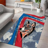 Multicolor area rug with wolf face, red center panel, and blue striped border