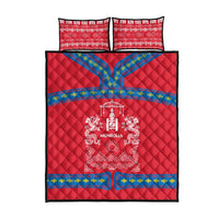 Red quilt bed set with two matching pillows, white Mongolia dragon-sun emblem, blue trim