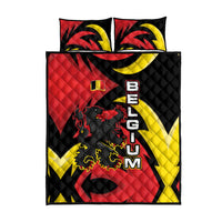 Quilt bed set with matching pillow covers; black, red, and yellow lion crest flame design