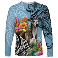 Cyan long-sleeve shirt with dog graphic, tropical flowers, and Polynesian-style patterns