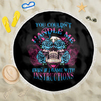 Beach blanket with blue-and-pink skull graphic on black, fringe border