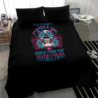 Black bedding set with multicolor triangle skull graphic on duvet, two pillowcases