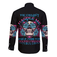 Black long-sleeve button shirt with triangle skull graphic and roses on back
