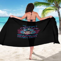 Black triangle skull sarong with colorful rose and text graphic on back