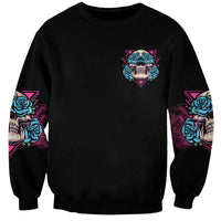 Black unisex sweatshirt with small chest skull-and-rose emblem and sleeve skull print