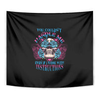Black triangle skull tapestry close-up with blue roses and colorful lettering