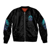 Black bomber jacket with front zip, teal skull witch chest patch, ribbed hem and cuffs