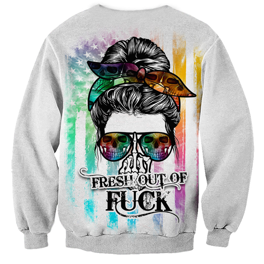 Multicolor tie-dye graphic crewneck sweatshirt with skull face and messy bun illustration