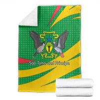 Green and yellow flag blanket with eagle coat of arms, shown folded with white towels