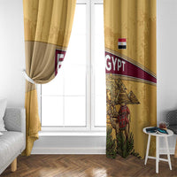 Yellow Egyptian window curtain with pyramids, Anubis, and camel caravan design on one side.