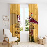 Yellow Egypt curtains with pyramids and Anubis artwork, camel caravan details, and palms.