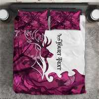 Pink camo deer bedding set with white panel, outlined antlers, and matching pillowcases