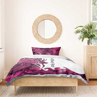 Pink camo deer bedding set with white duvet panel, antler silhouette, and two pillowcases