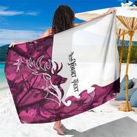 Pink and white deer camo sarong with stylized buck silhouette and tribal lettering, large drape
