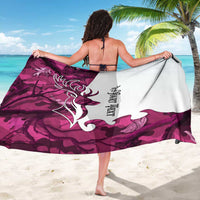 Pink camo deer hunting sarong with white panel, buck silhouette and lettering, draped around body