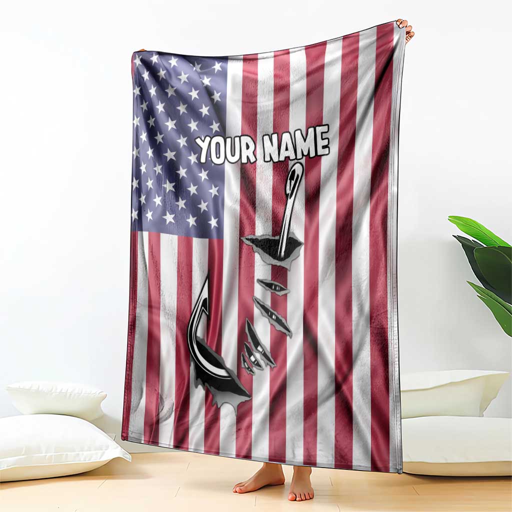 American flag blanket draped outdoors with custom name and fish hook graphic