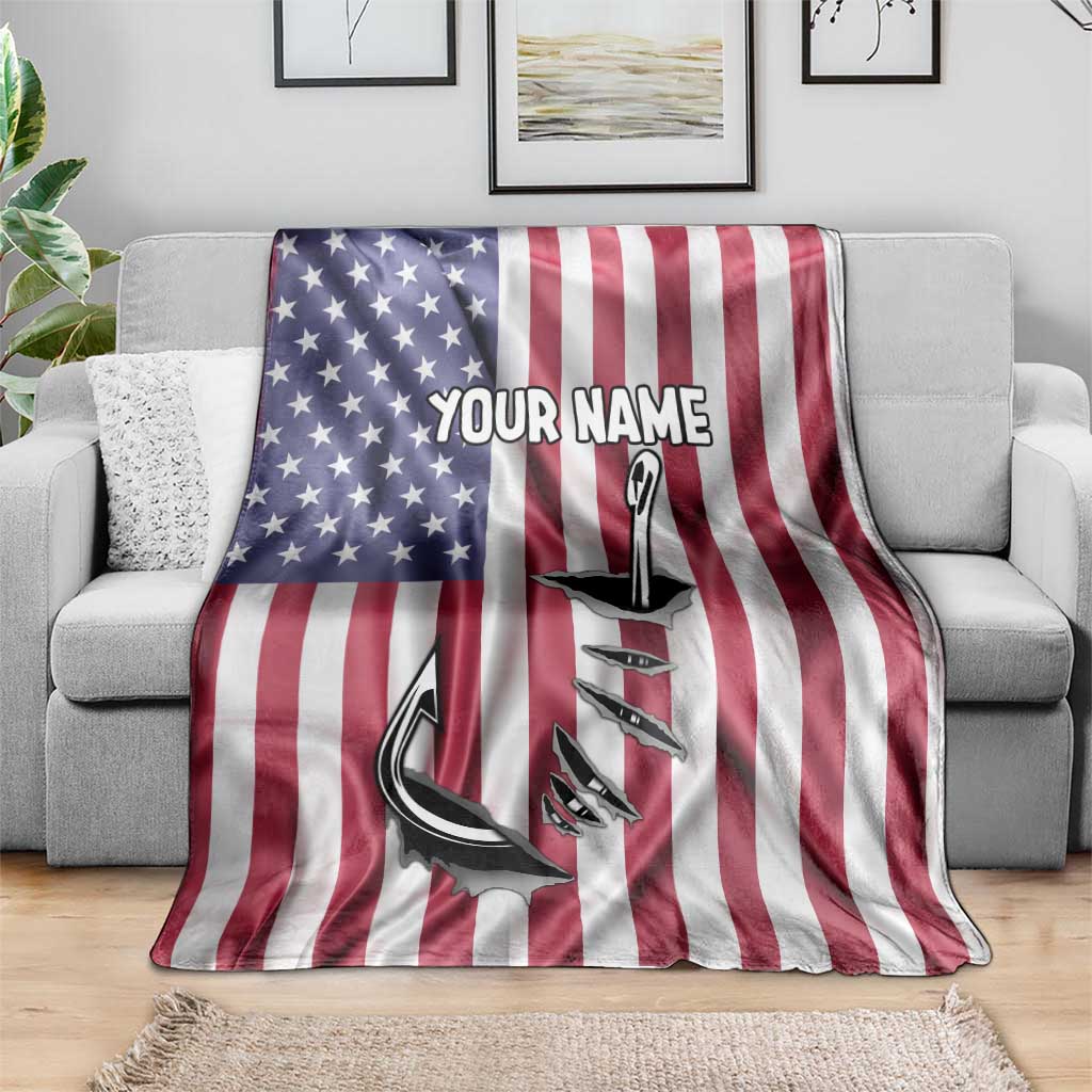 American flag blanket on gray sofa with custom name and fish hook graphic