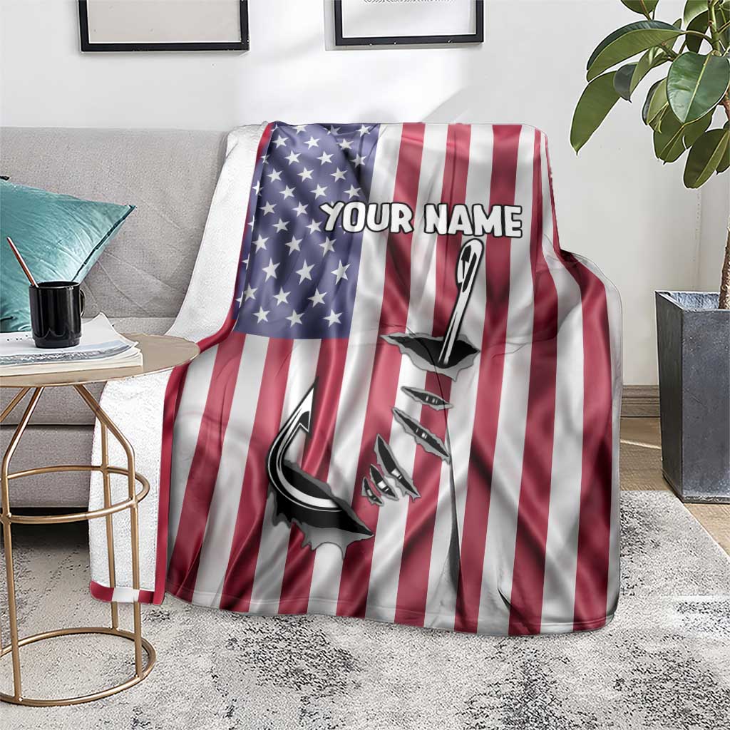 American flag blanket on floor with custom name and fish hook graphic, star-striped design
