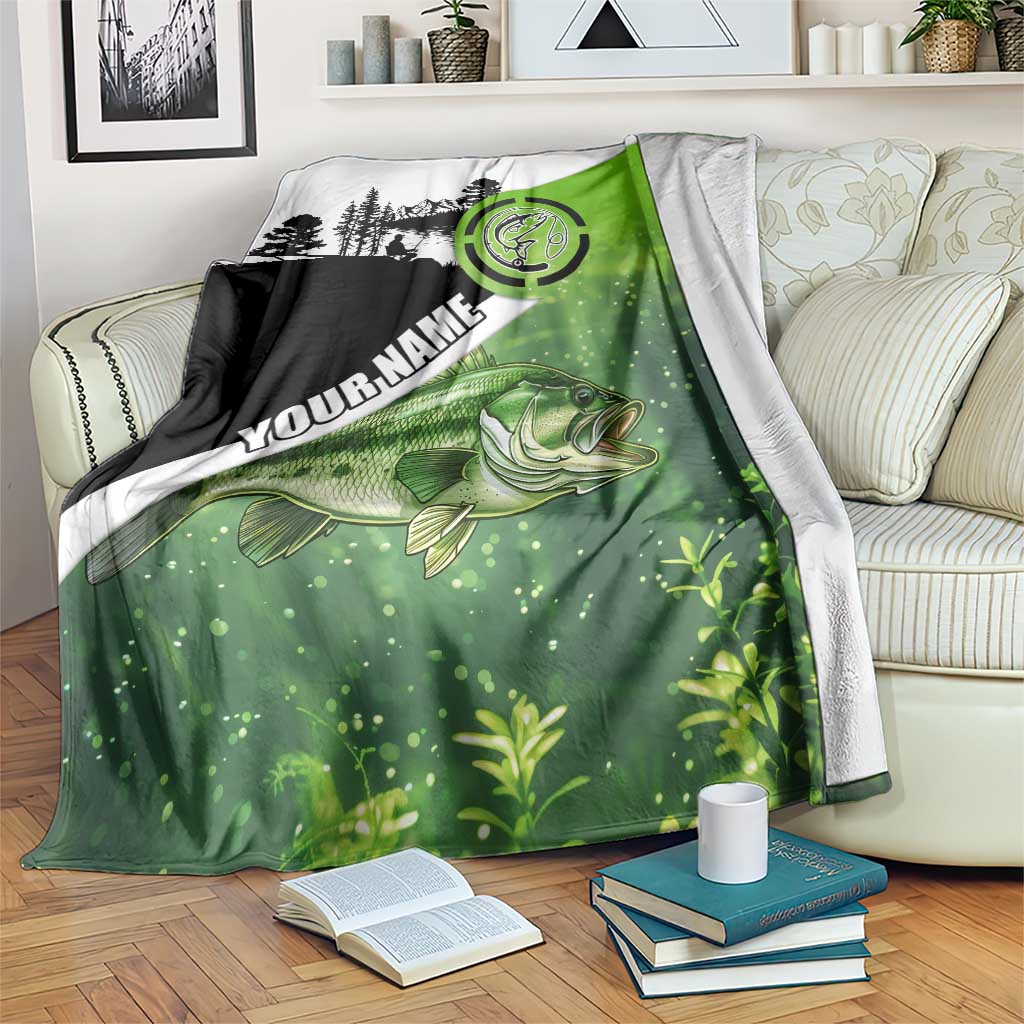 Green and black fishing blanket with bass illustration, custom name text, and trees