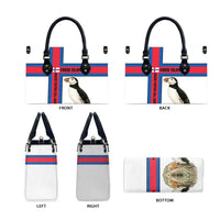 White tote bag shown from front, back, sides, and bottom; puffin and cross stripe