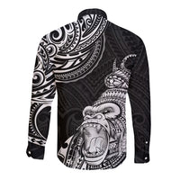 Black long sleeve button shirt with white gorilla face graphic and Polynesian sleeve designs