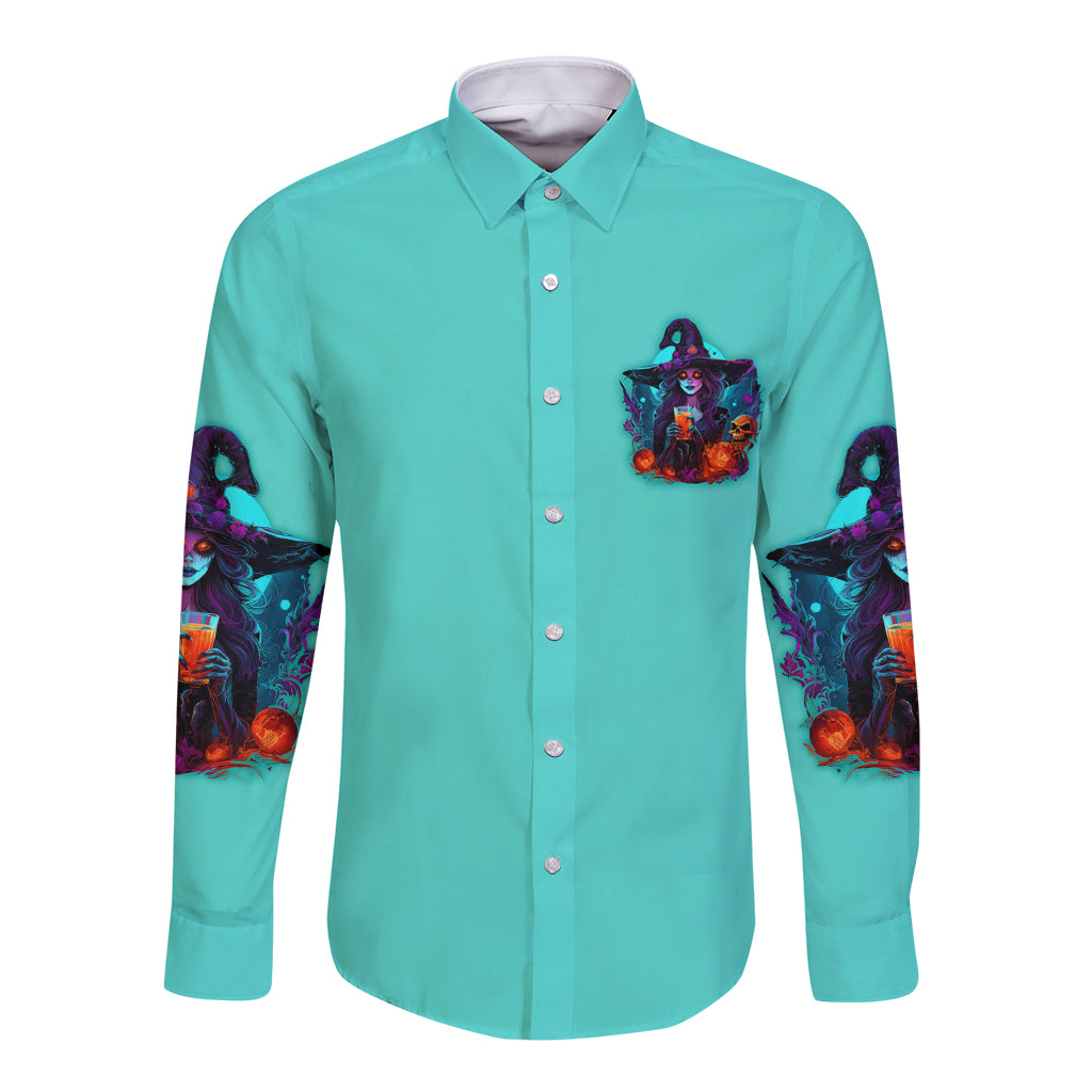 Teal long-sleeve button shirt with chest witch emblem and colorful printed sleeves