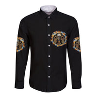 Black long-sleeve button shirt with chest skull emblem and sleeve graphics.
