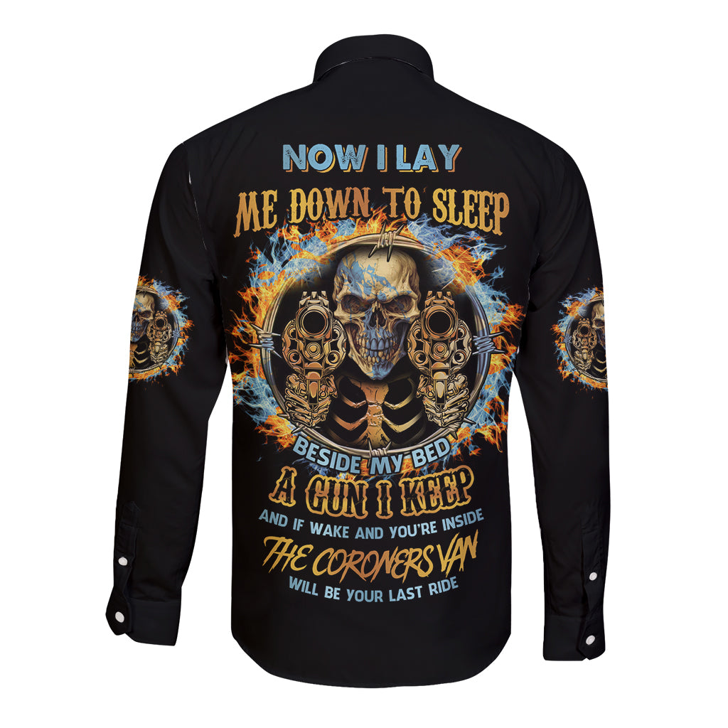 Black long-sleeve button shirt with skull graphic on back.