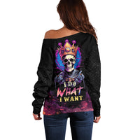 Black off-shoulder sweater with colorful skull graphic and I DO WHAT I WANT text
