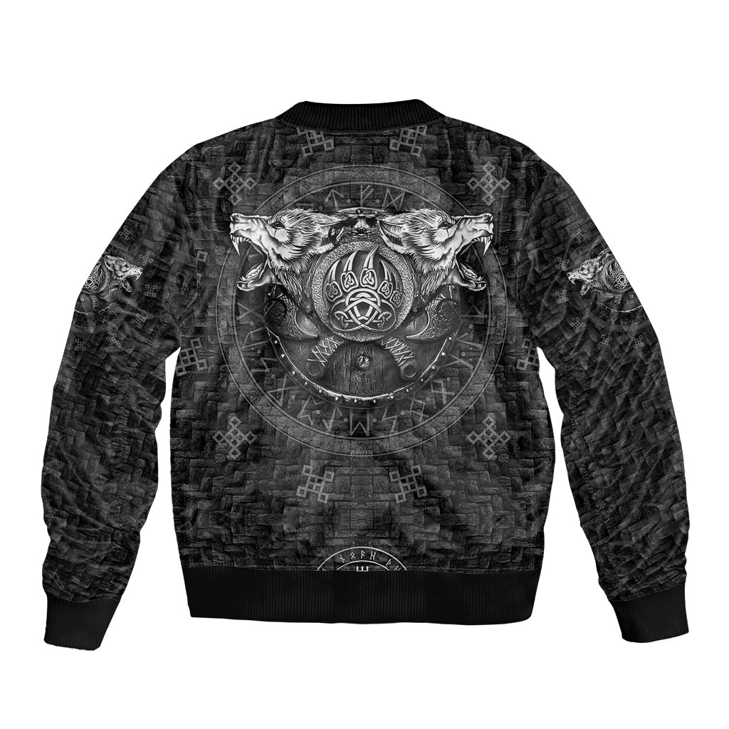 Black unisex bomber jacket with circular wolf crest back graphic, ribbed hem